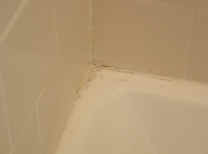Corner of Shower Pan -�before