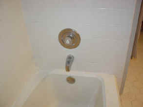 A 15 year old bathroom with grout failure