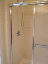 Shower After - cleaned, re-grouted, re-caulked