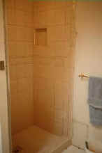 the shower was too damaged to repair and had to be completely re-done